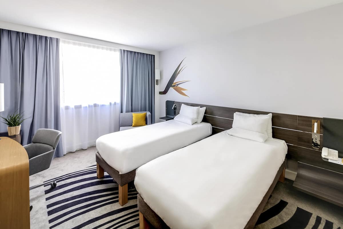 Klassieke Twin kamer, 2 eenpersoonsbedden | Luxe beddengoed, een minibar met enkele gratis items