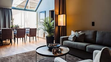 Junior Suite (Villa) | Living area | Flat-screen TV