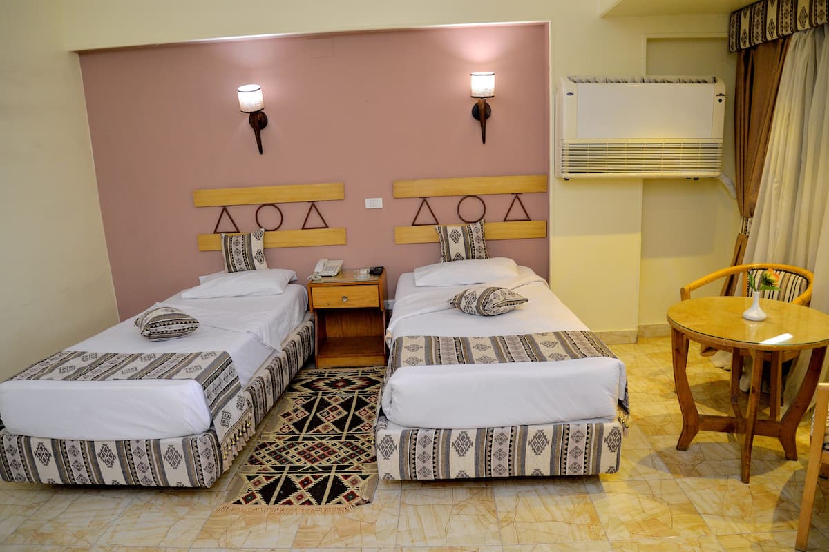 1 Schlafzimmer, Pillowtop-Betten, Minibar, individuell dekoriert