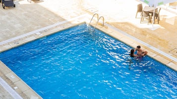 Outdoor pool, sun loungers