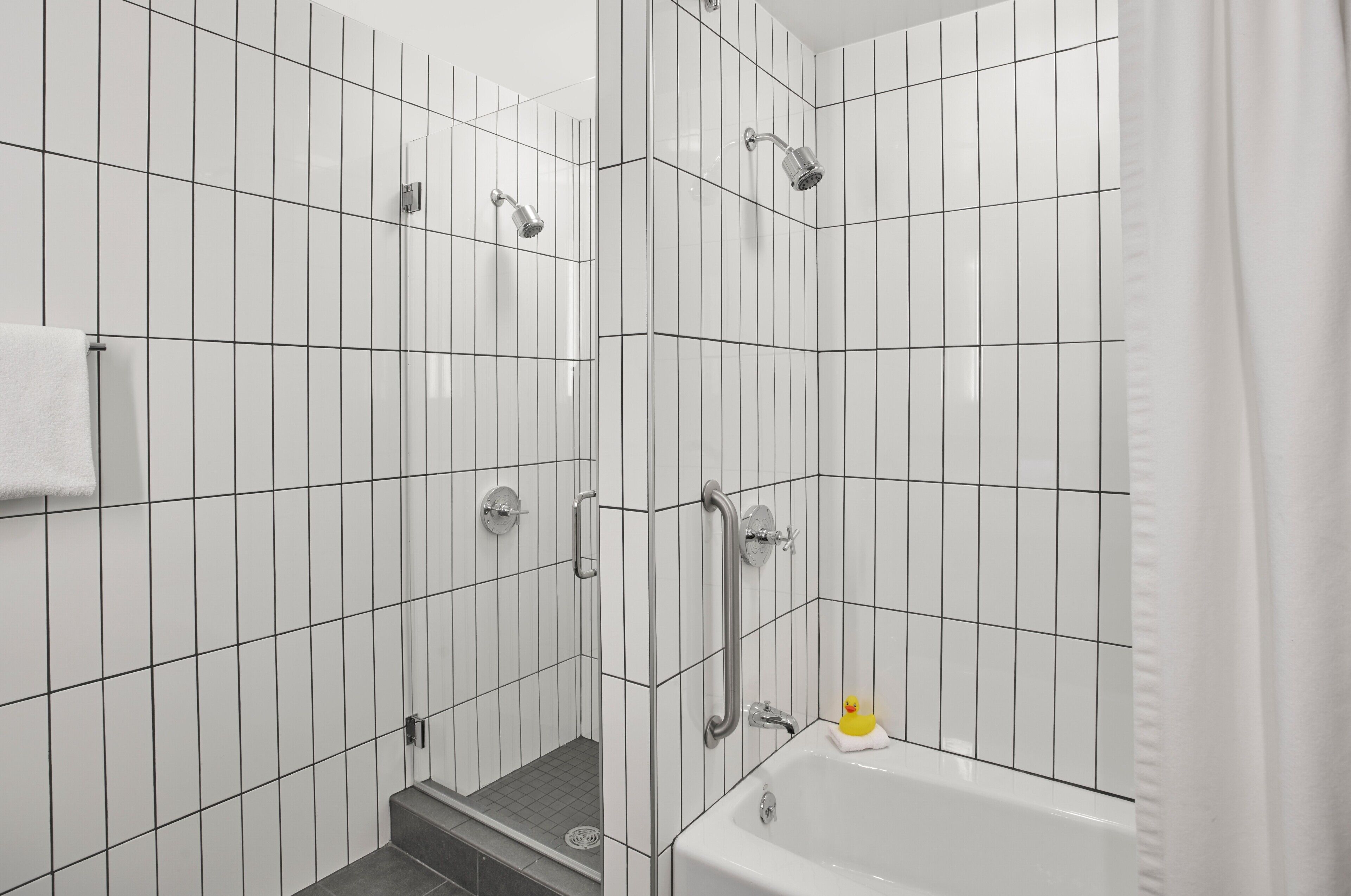 suite (atrium) | bathroom | designer toiletries, hair dryer, bathrobes, towels