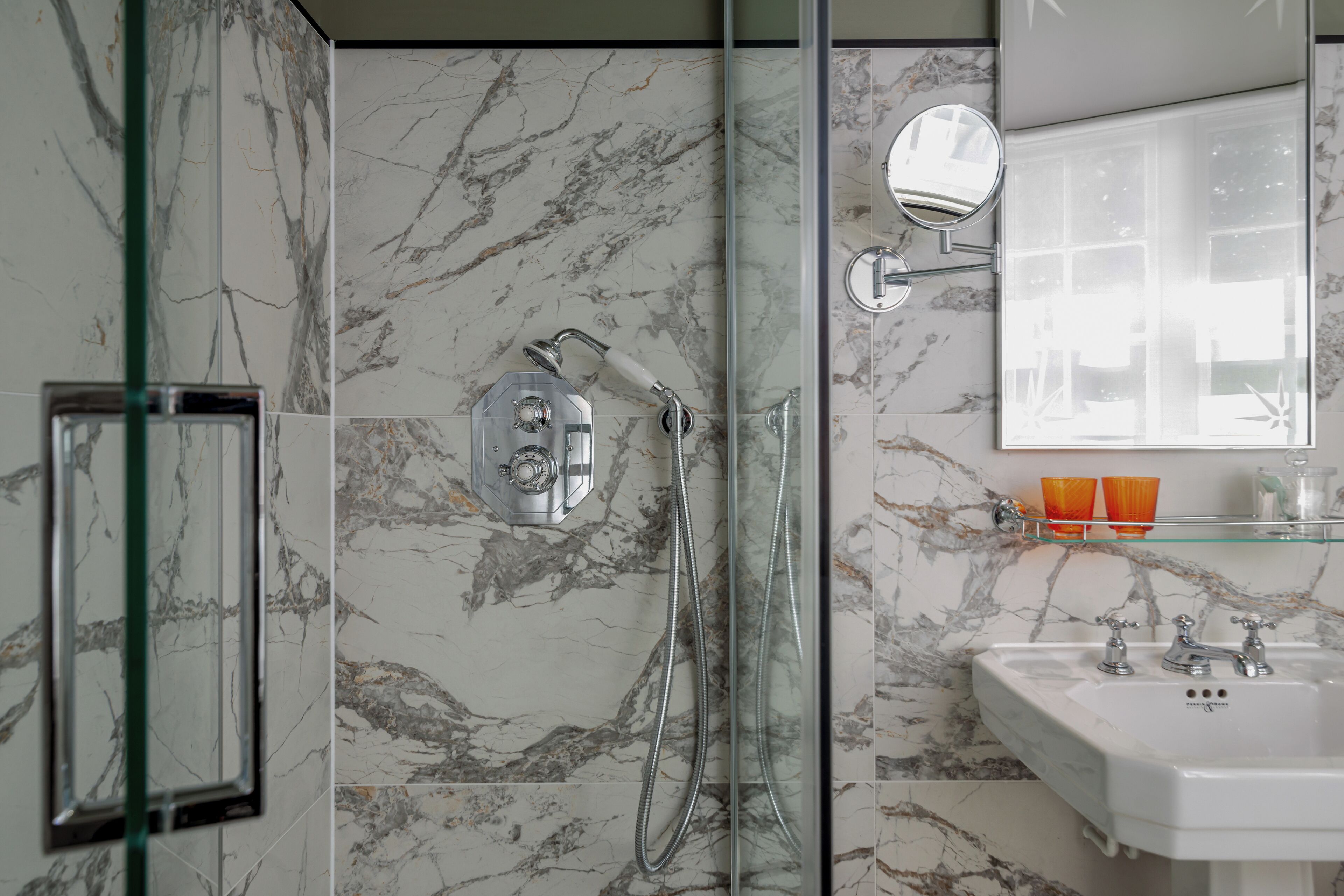 premium room, river view | bathroom | shower, designer toiletries, hair dryer, bathrobes