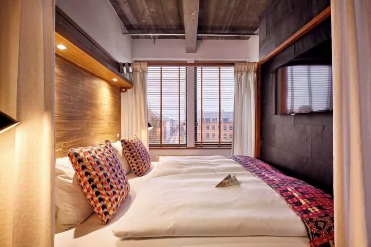 Literie hypoallergénique, minibar, coffres-forts dans les chambres