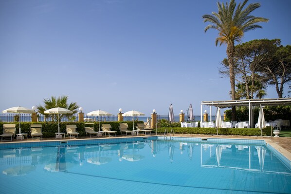 Outdoor pool, pool umbrellas, pool loungers