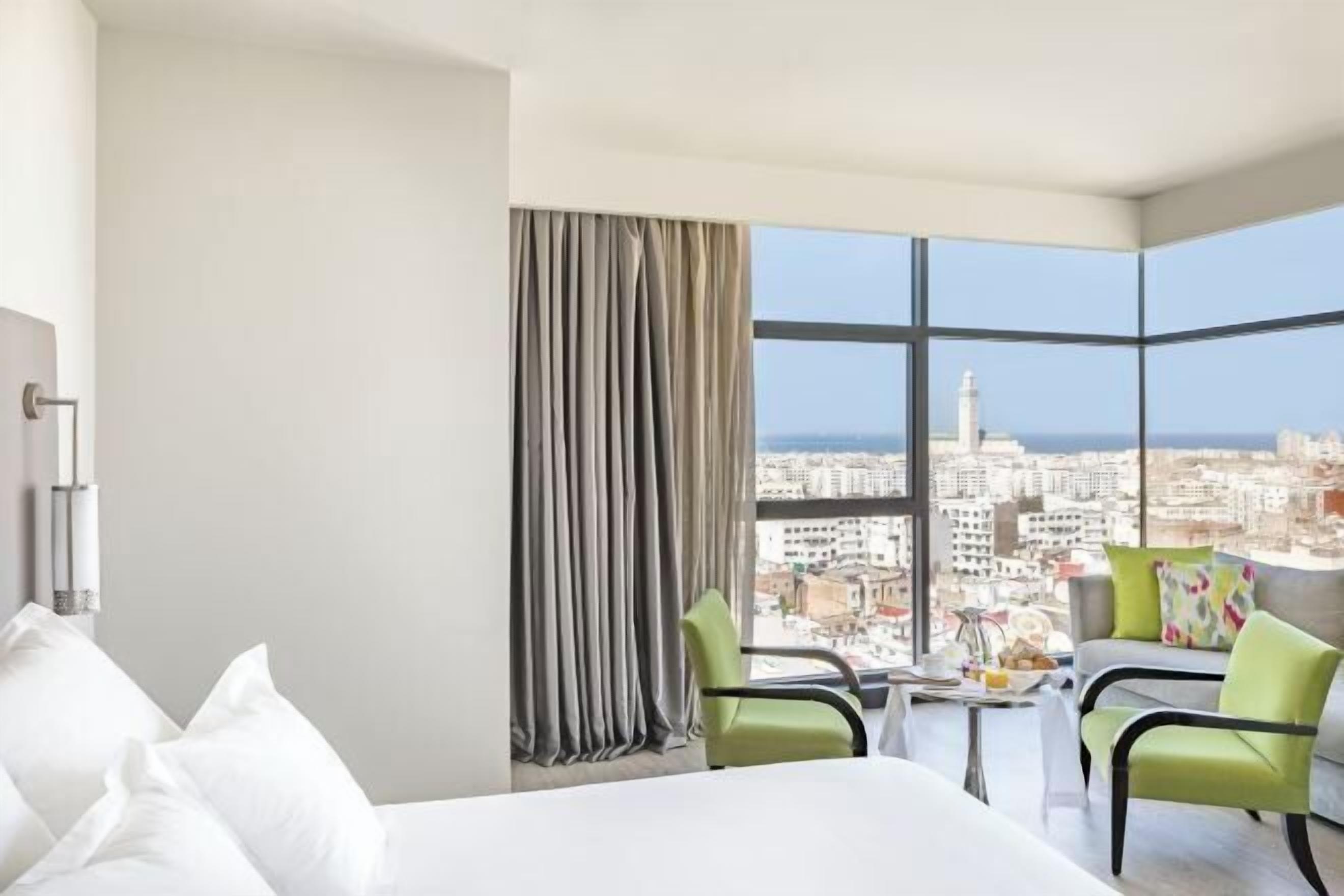 Lakens van Egyptisch katoen, luxe beddengoed, een kluis op de kamer