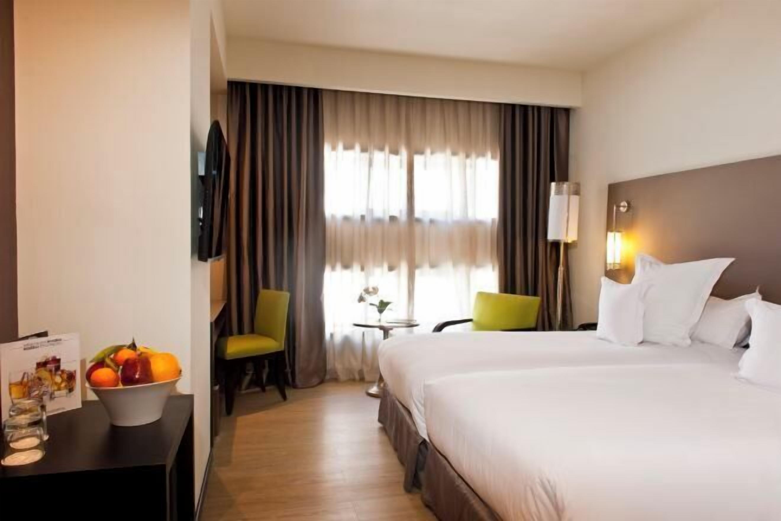 Lakens van Egyptisch katoen, luxe beddengoed, een kluis op de kamer