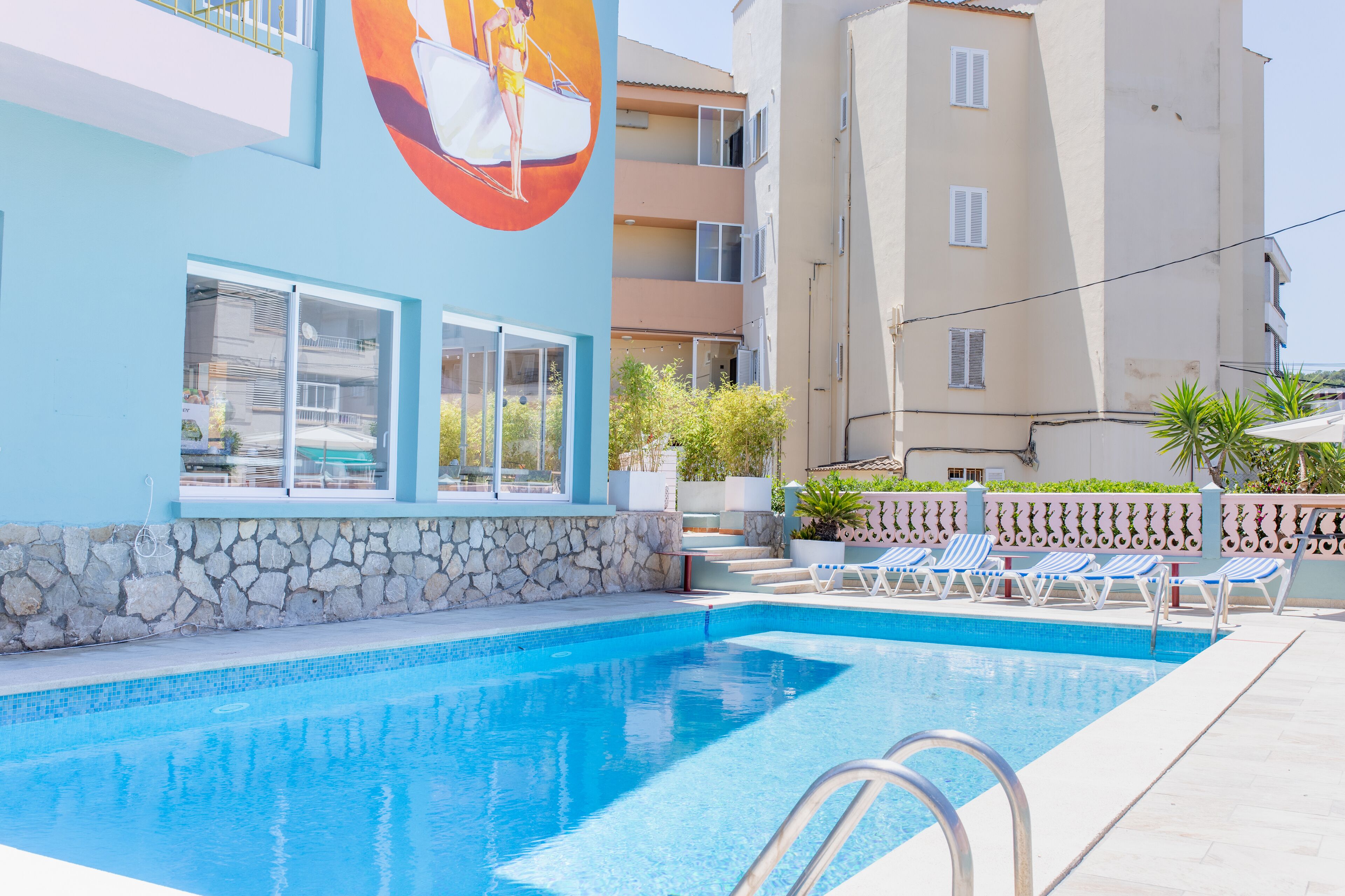 Seasonal outdoor pool, open 10:00 AM to 8:00 PM, sun loungers
