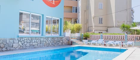 Seasonal outdoor pool, open 10:00 AM to 8:00 PM, sun loungers