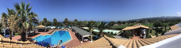 Seasonal outdoor pool, open 11 AM to 7:30 PM, pool umbrellas - OASIS HOTEL KYPARISSIA (Trifylia)