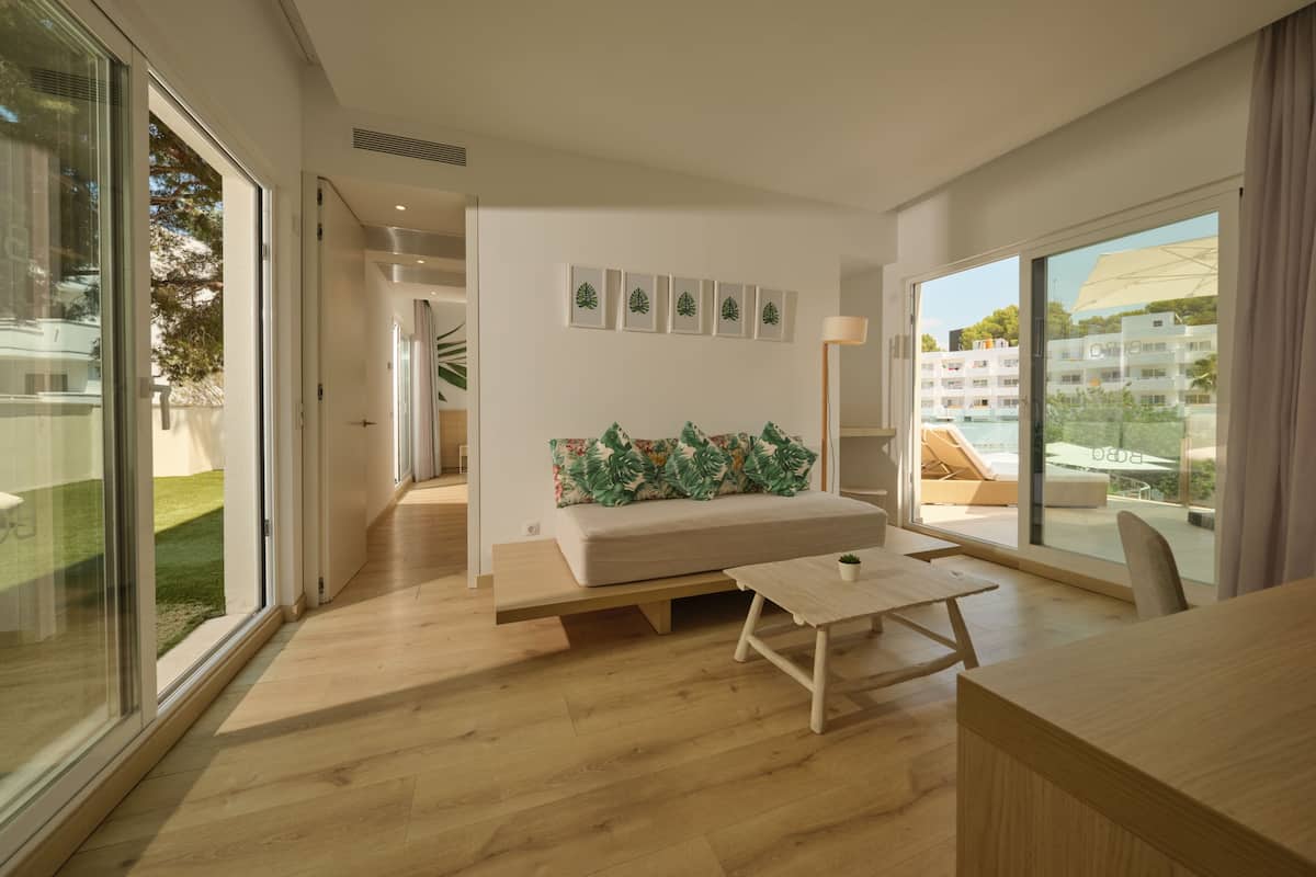 Junior Suite, Terrace, Pool View | Living area | 32-inch TV with satellite channels