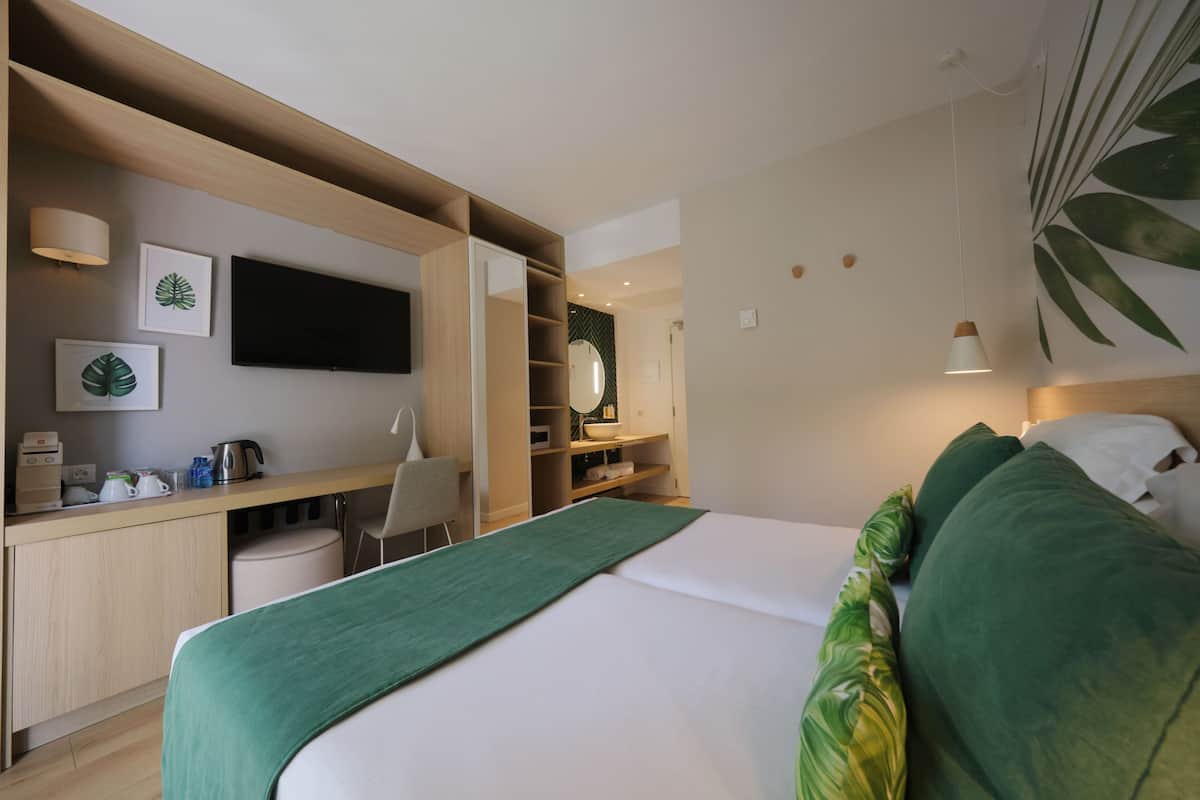 Standard Double Room, Balcony | Minibar, in-room safe, desk, laptop workspace