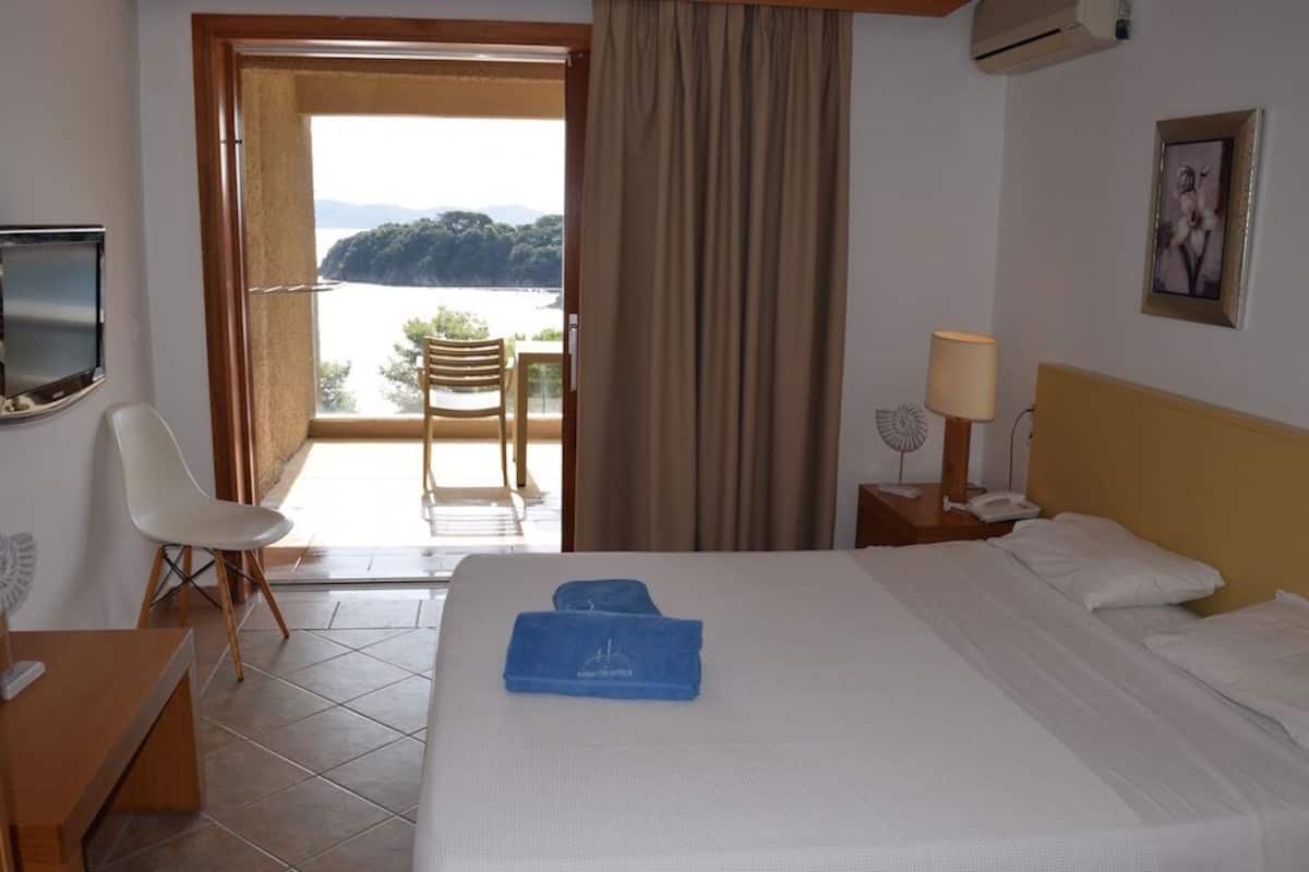 Quarto família, vista para o mar | Cofres nos quartos, cortinas blackout, roupa de cama
