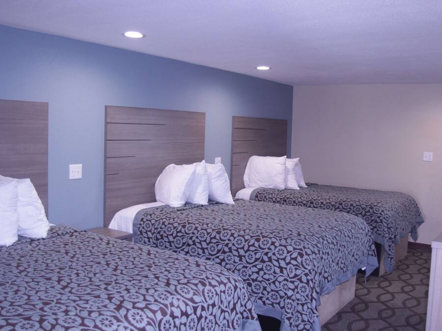 Room, 3 Double Beds, Non-Smoking, Kitchenette | Iron/ironing board, free WiFi, bed sheets