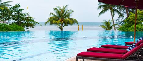 2 outdoor pools, pool umbrellas, sun loungers