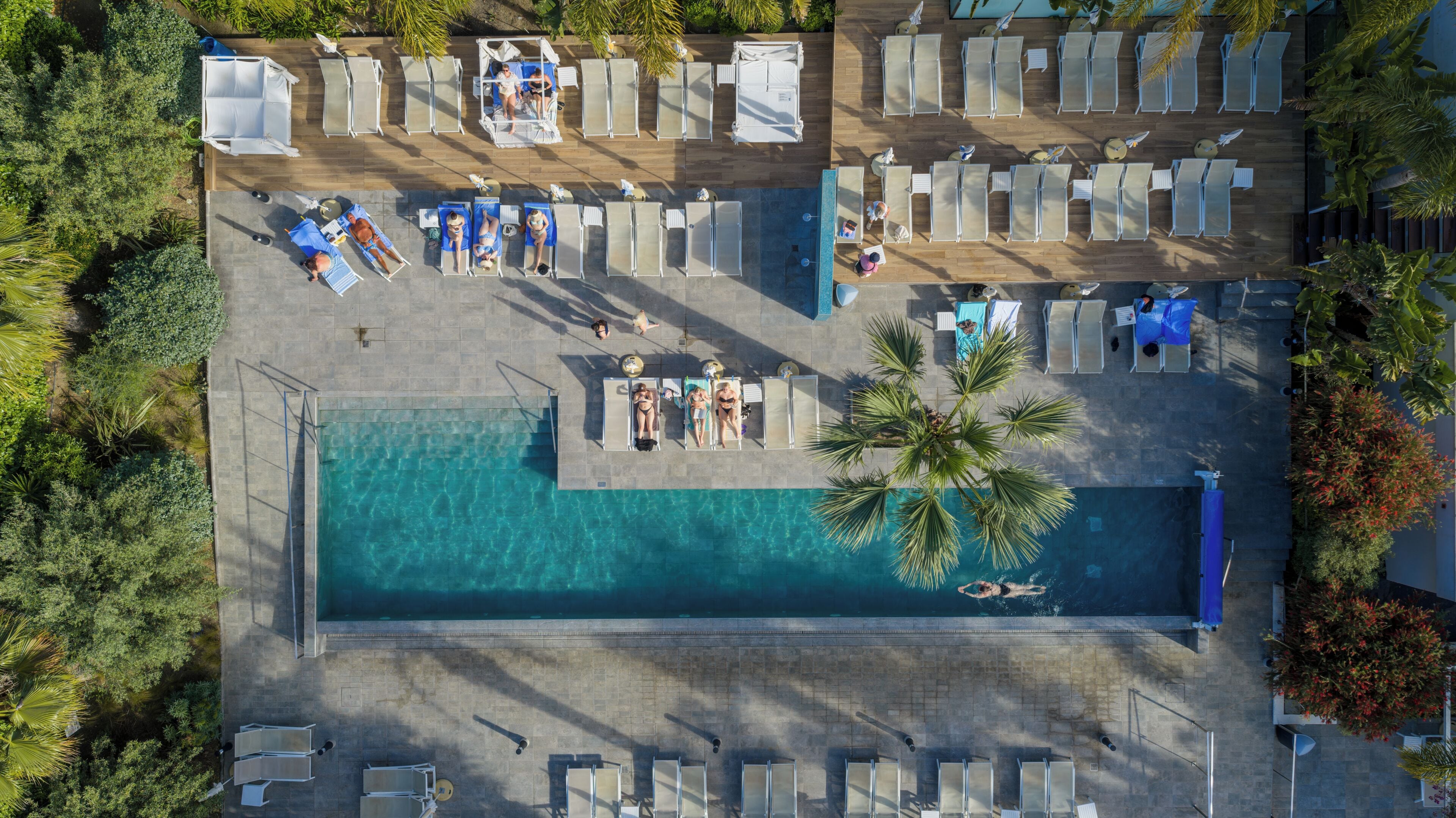 3 outdoor pools, open 9:00 AM to 8:00 PM, pool umbrellas, sun loungers