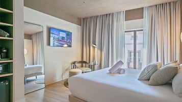 Superior Double Room | Minibar, in-room safe, laptop workspace, blackout drapes