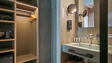Separate bathtub and shower, rainfall showerhead, hair dryer, towels