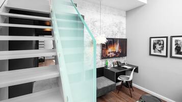 Duplex Suite | Living area | Flat-screen TV