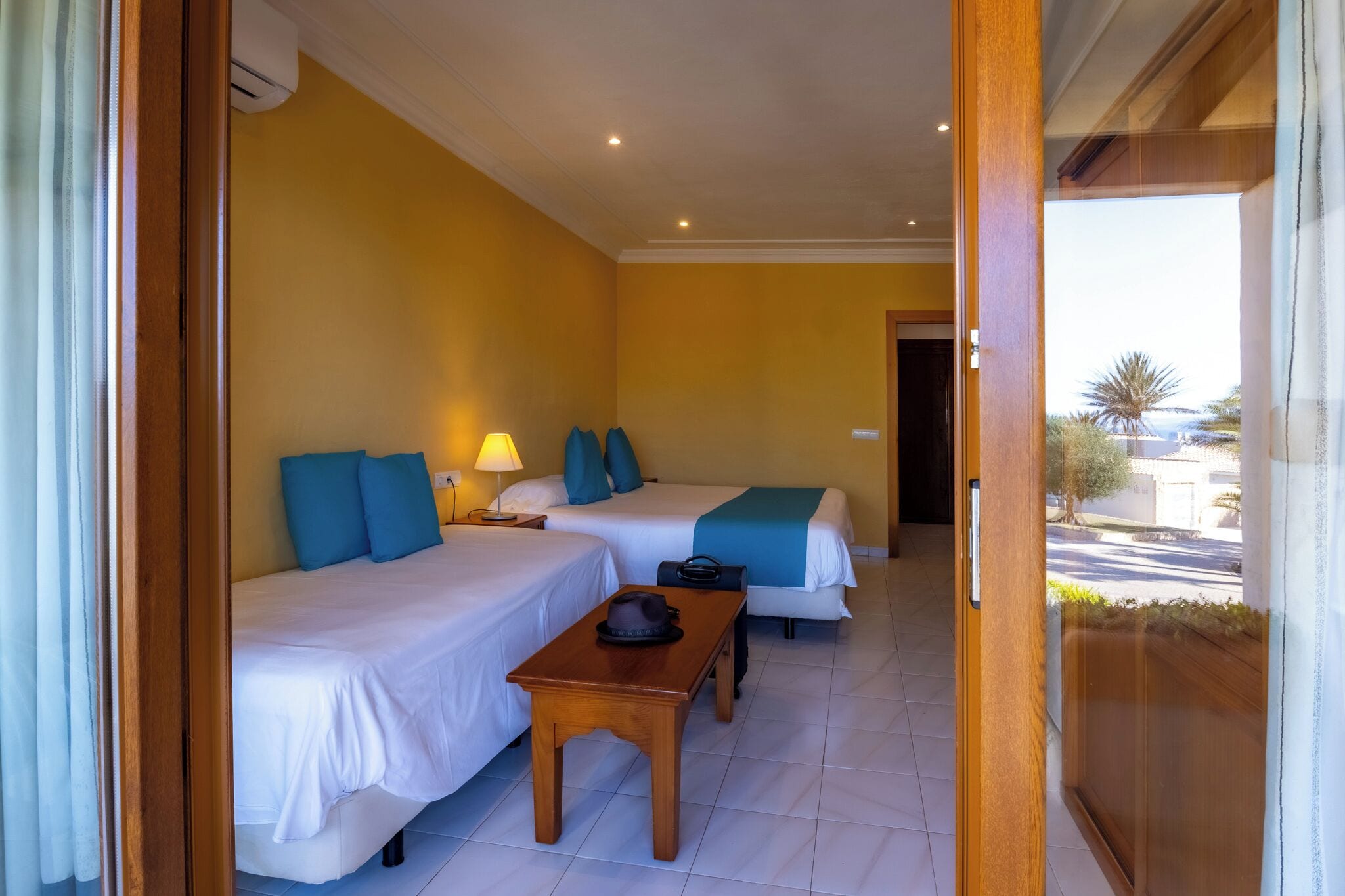 triple room, garden view | 1 bedroom, in-room safe, blackout curtains, soundproofing