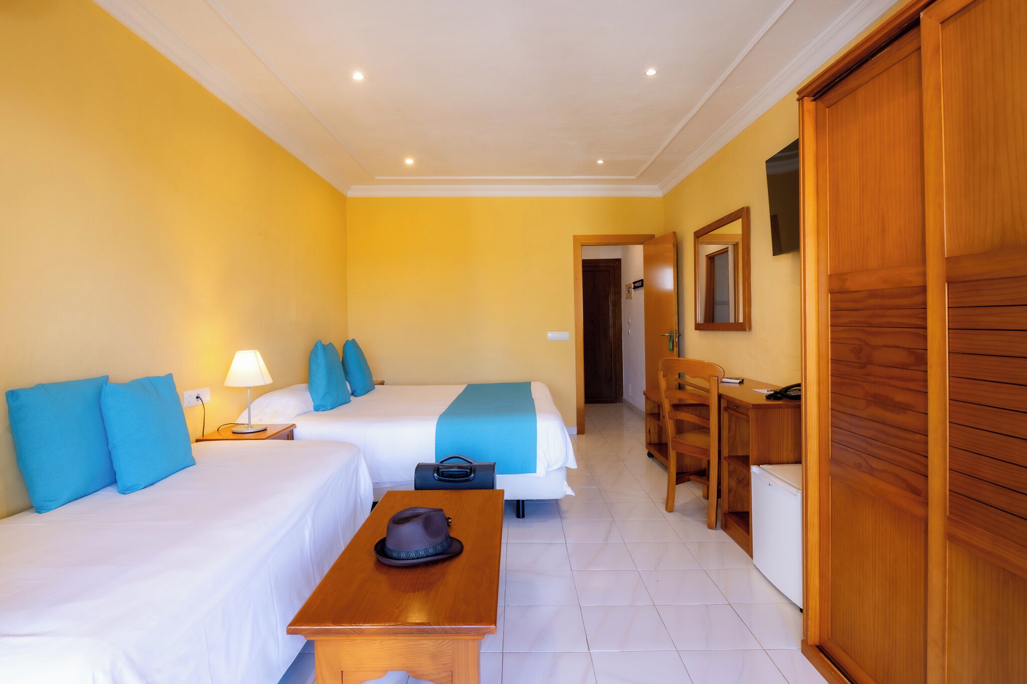 Dreibettzimmer, Gartenblick | Zimmersafe, Verdunkelungsvorhänge, schallisolierte Zimmer