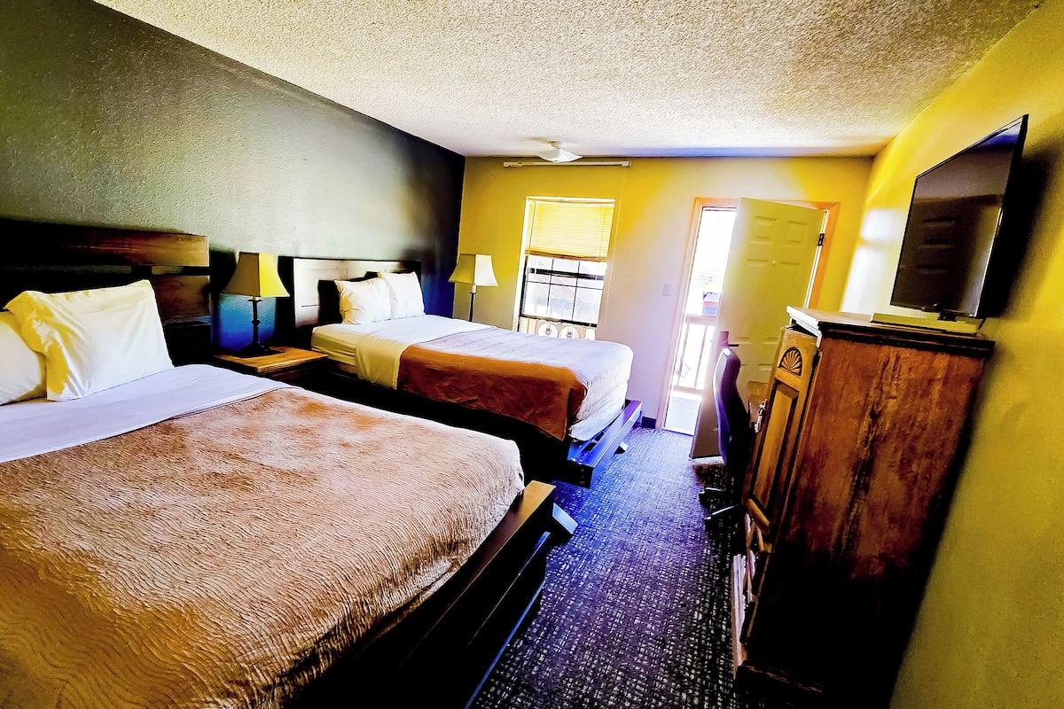 Room, 2 Queen Beds, Non Smoking (Upgrade) | Desk, blackout curtains, iron/ironing board, rollaway beds