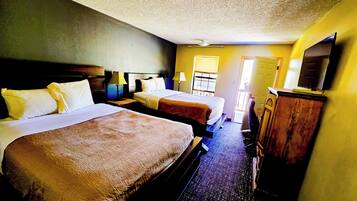 Desk, blackout drapes, iron/ironing board, rollaway beds