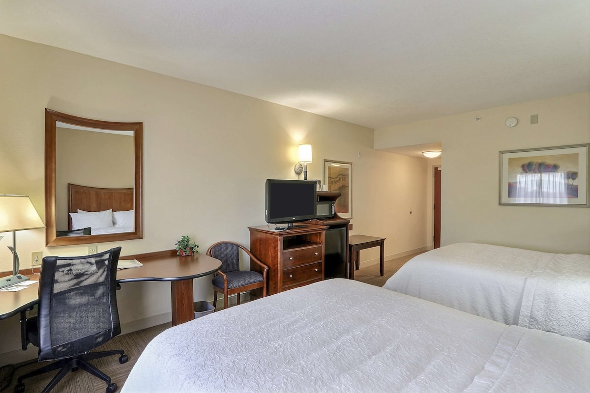 Premium bedding, down comforters, desk, laptop workspace