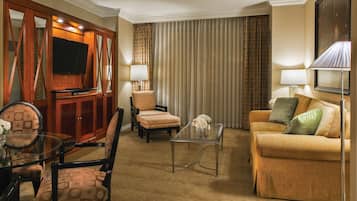Standard Room | Living room | 42-inch flat-screen TV with cable channels, TV, iPod dock