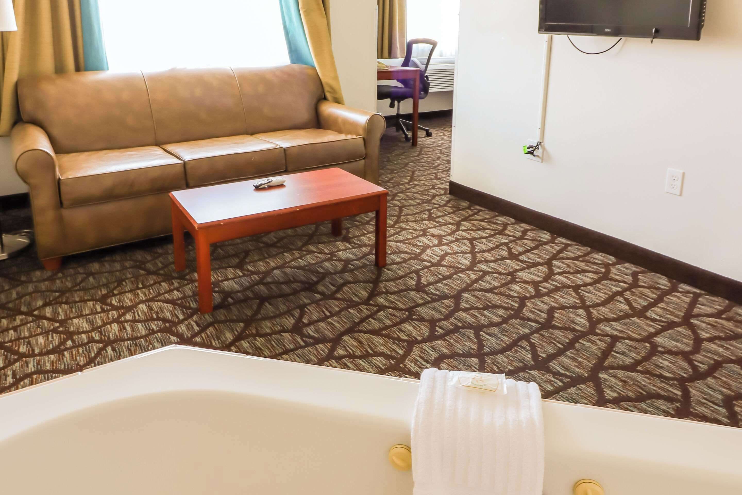 premium bedding, desk, blackout curtains, iron/ironing board