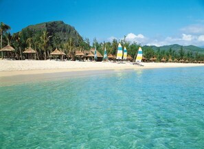 Private beach, white sand, sun-loungers, beach umbrellas - Indian Resort & Spa Mauritius (Le Morne)