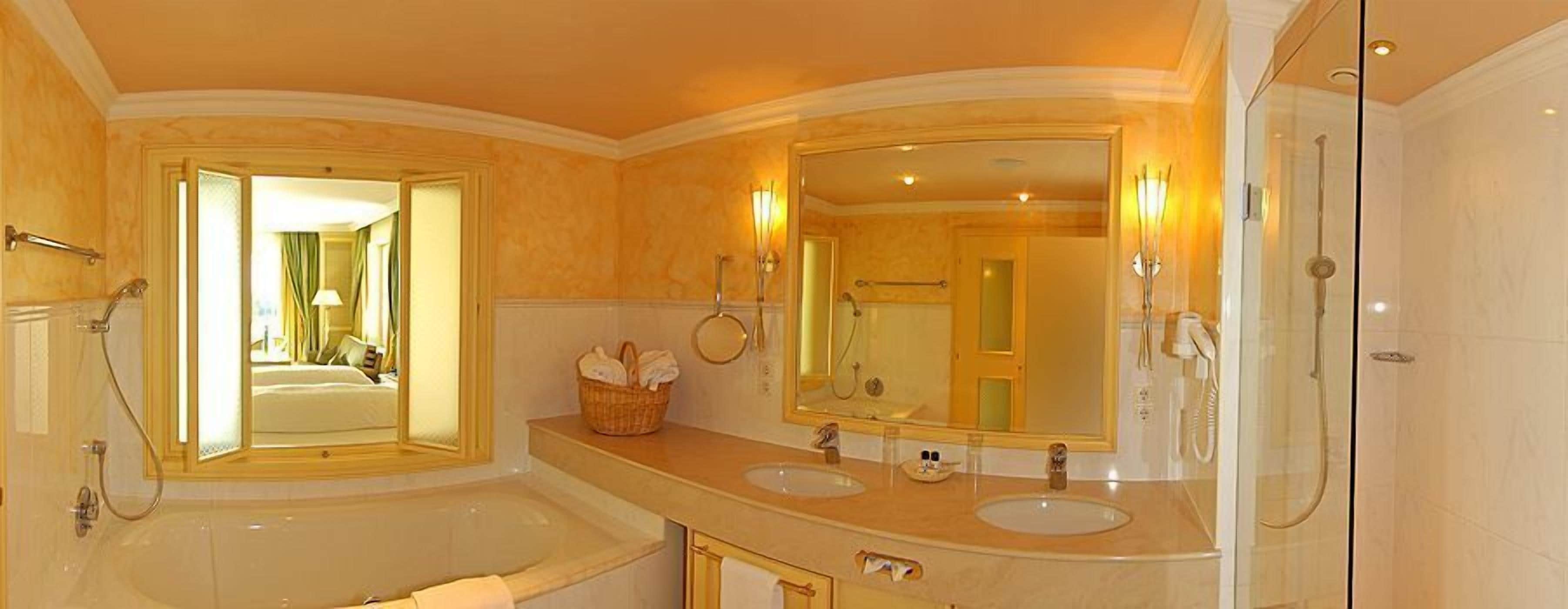 combined shower/bathtub, free toiletries, hair dryer, bathrobes