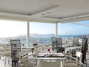 Breakfast, lunch, dinner served; Greek cuisine, pool views