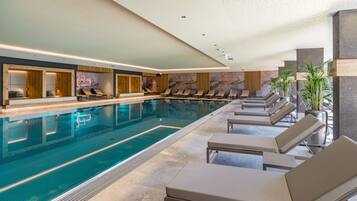 Indoor pool, open 7:00 AM to 8:00 PM, pool loungers