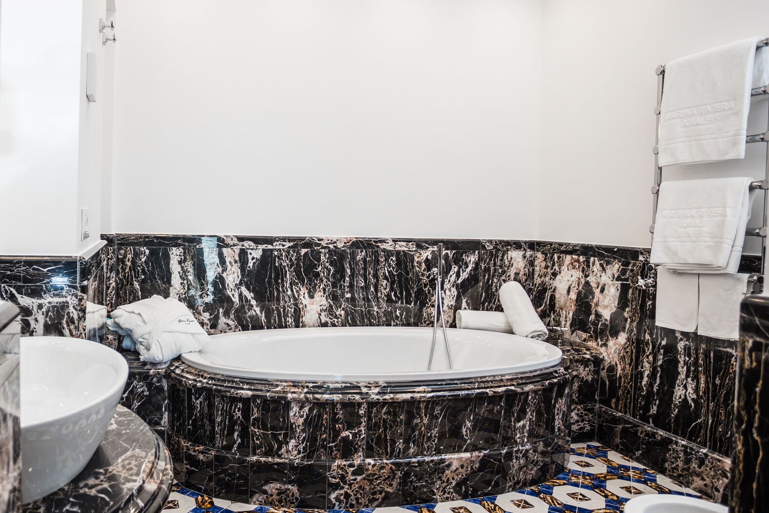 master suite | bathroom | shower, eco-friendly toiletries, hair dryer, bathrobes