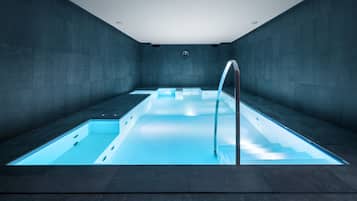 Seasonal outdoor pool, open 7:00 AM to 7:00 PM, pool umbrellas