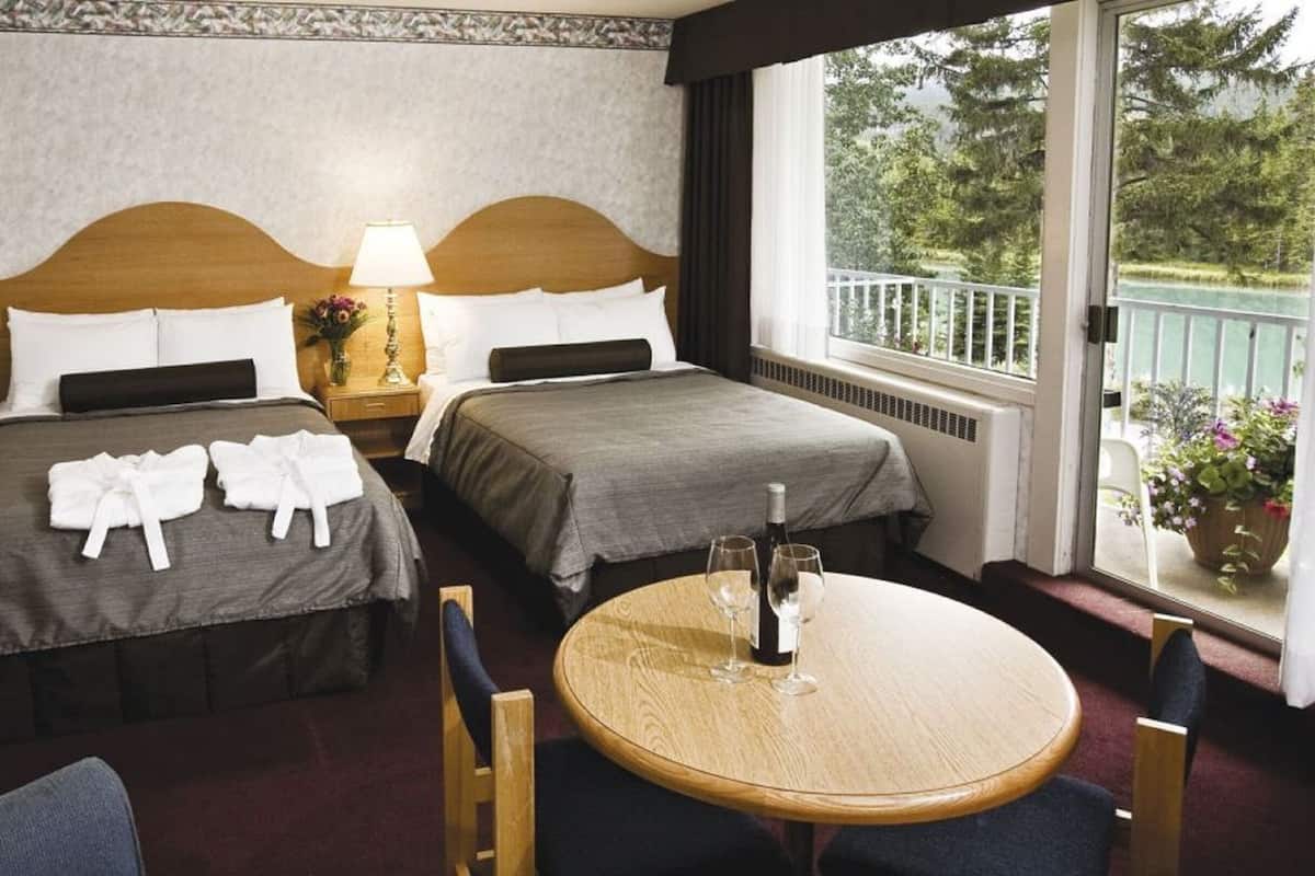 Hypo-allergenic bedding, blackout drapes, iron/ironing board, free WiFi