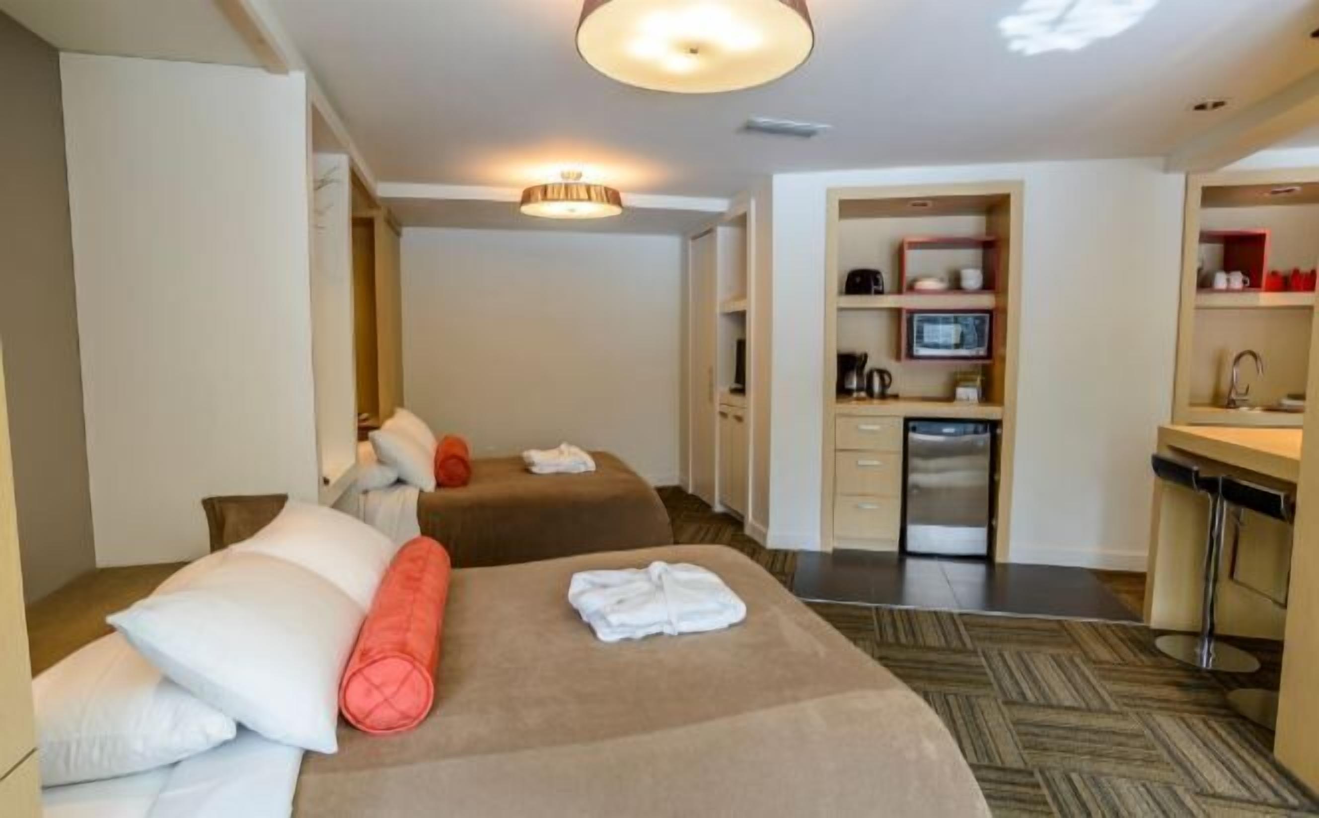 Hypo-allergenic bedding, blackout drapes, iron/ironing board, free WiFi