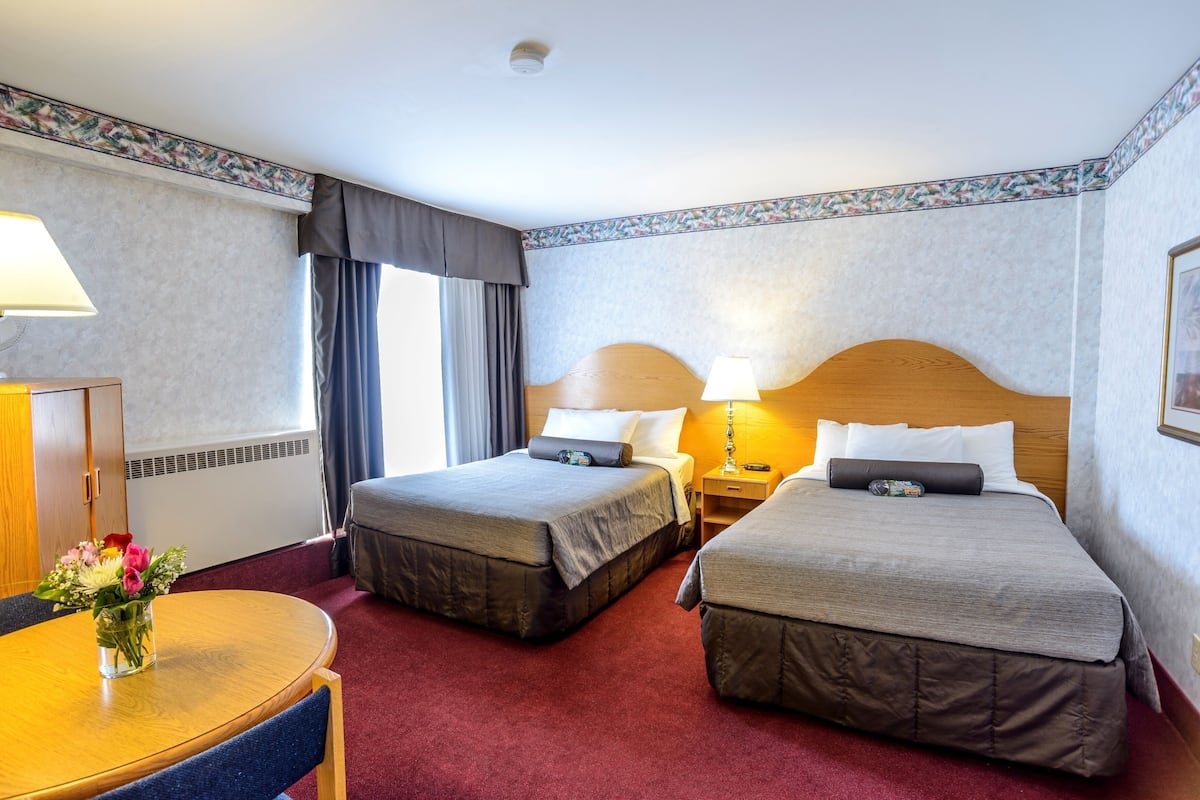 Hypo-allergenic bedding, blackout drapes, iron/ironing board, free WiFi