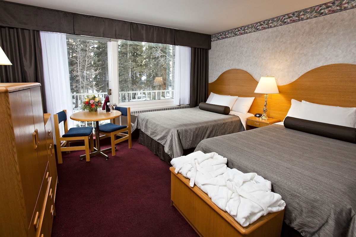 Hypo-allergenic bedding, blackout drapes, iron/ironing board, free WiFi