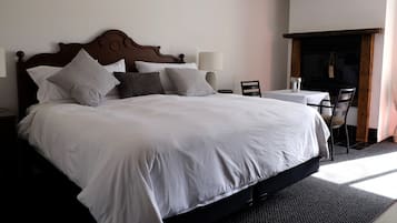 Superior King Room with Fireplace | Individually decorated, desk, blackout drapes, iron/ironing board