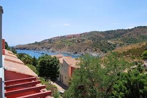 Enjoy breathtaking views of the sea from this hillside retreat.