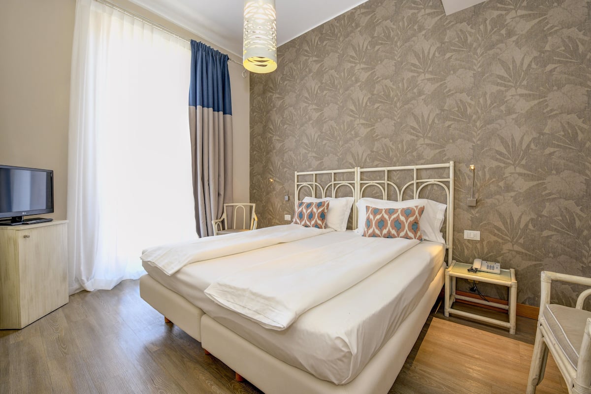 Standard Double or Twin Room | Down comforters, minibar, in-room safe, desk