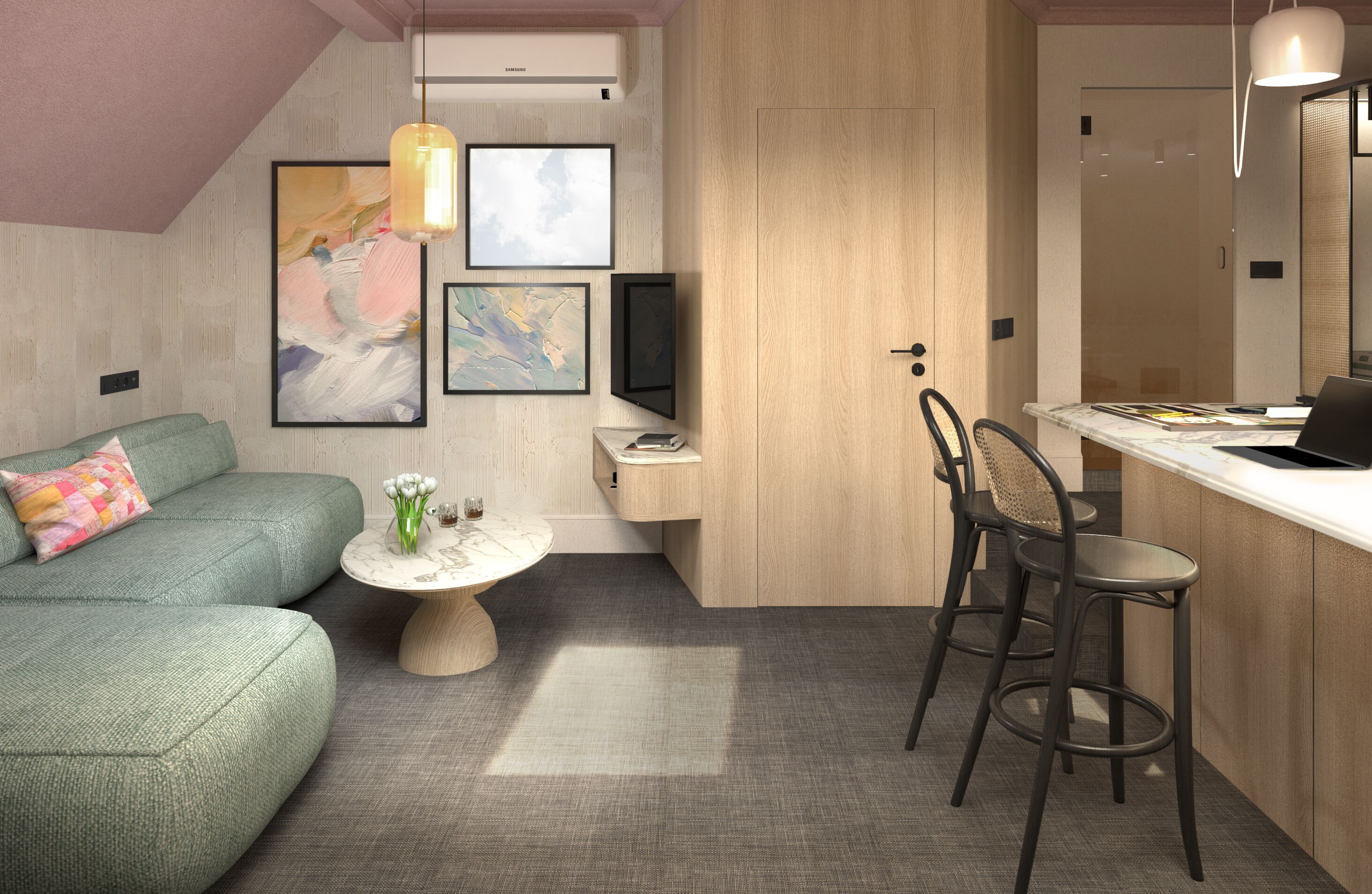 A modern living room with a green sofa, a round coffee table with flowers, and a dining area with two chairs and a laptop.