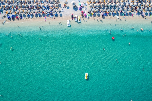On the beach, sun loungers, beach umbrellas, beach volleyball