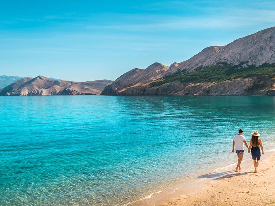 On the beach, sun-loungers, beach umbrellas