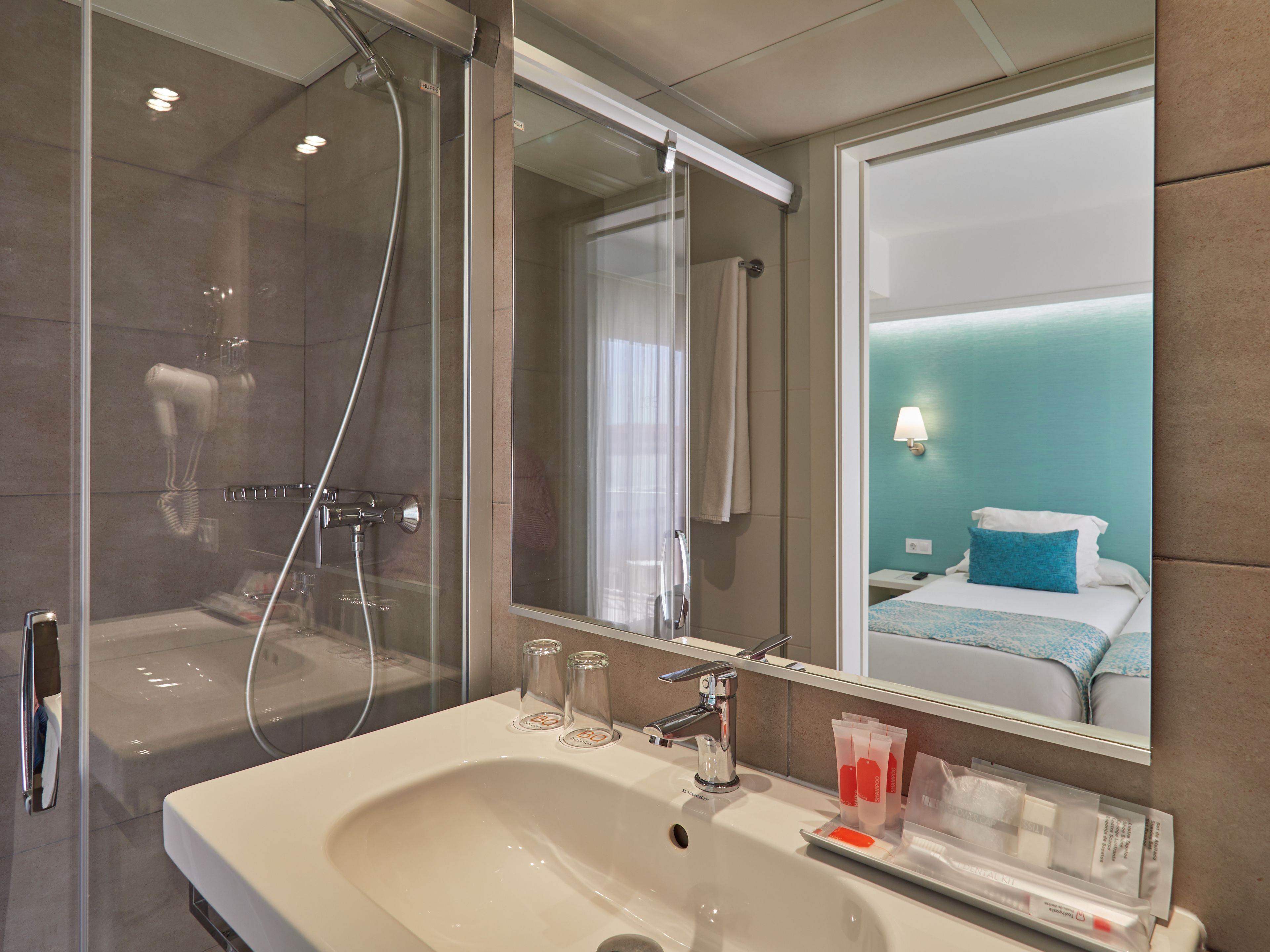 shower, free toiletries, hair dryer, towels