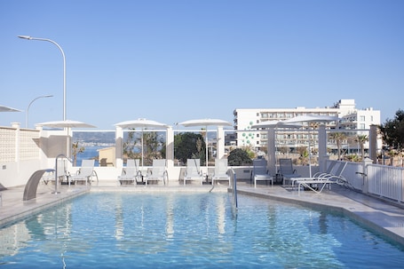 Indoor pool, outdoor pool, pool umbrellas, sun loungers