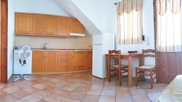 Apartment | Private kitchen | Fridge, coffee/tea maker, electric kettle, cookware/dishes/utensils