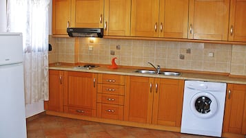 Apartment | Private kitchen | Fridge, coffee/tea maker, electric kettle, cookware/dishes/utensils
