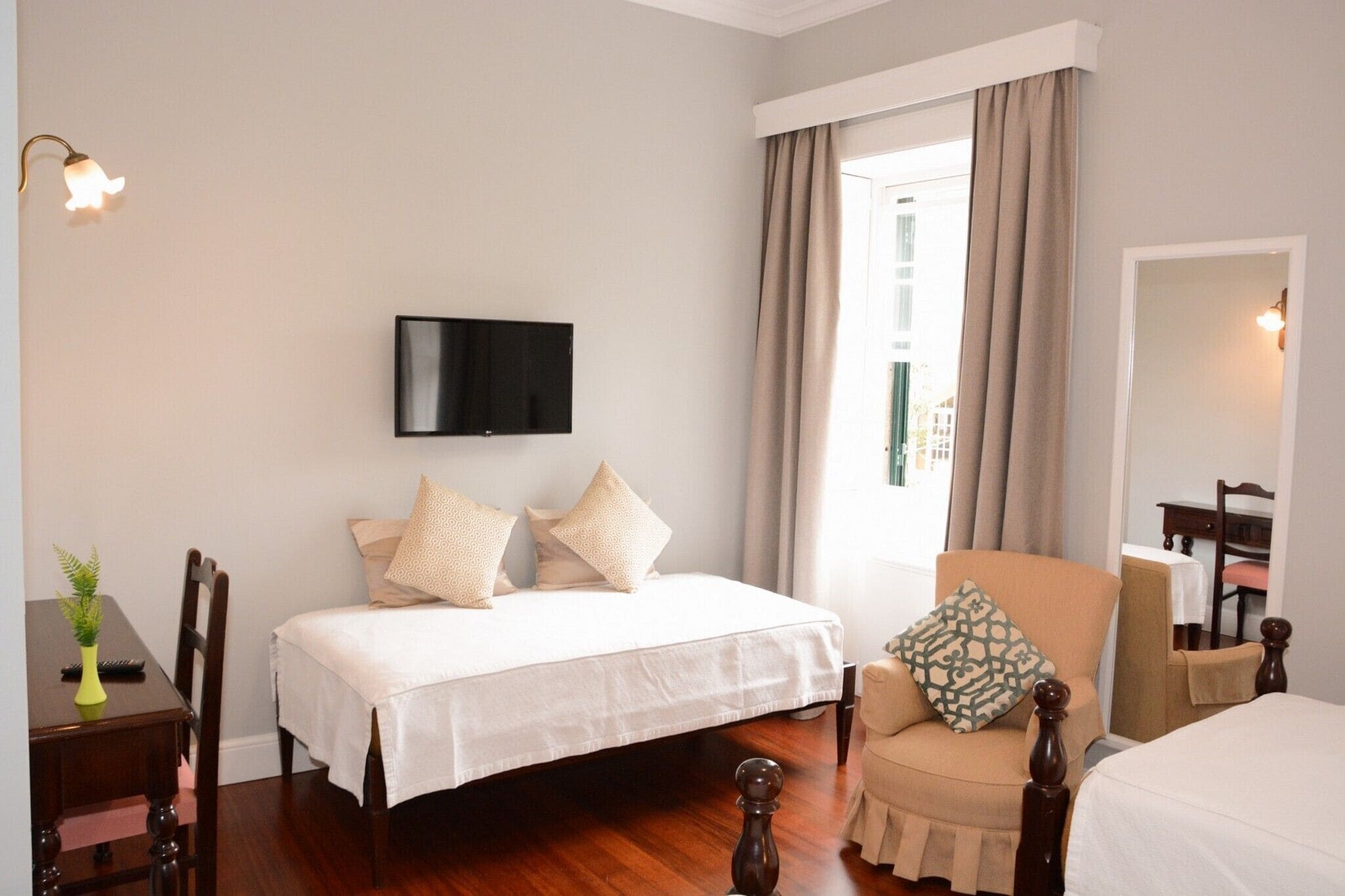 Desk, laptop workspace, blackout curtains, free WiFi